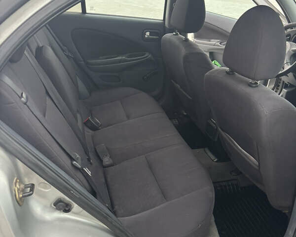 Серый Ниссан Альмера, объемом двигателя 1.5 л и пробегом 226 тыс. км за 3350 $, фото 9 на Automoto.ua