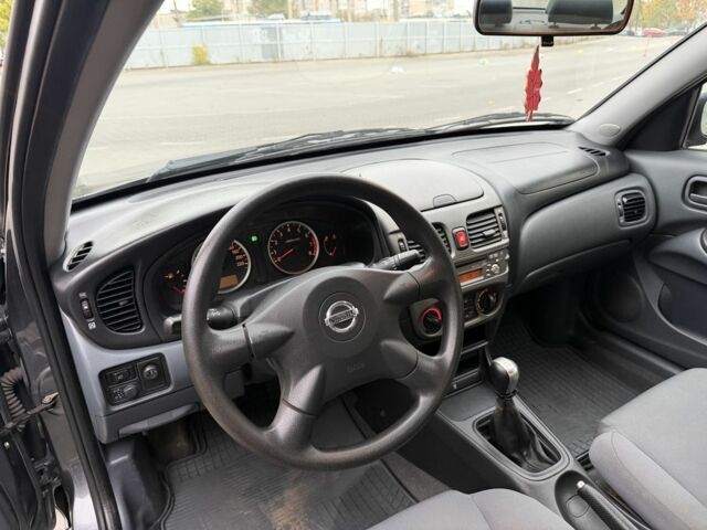 Серый Ниссан Альмера, объемом двигателя 1.8 л и пробегом 105 тыс. км за 3800 $, фото 4 на Automoto.ua