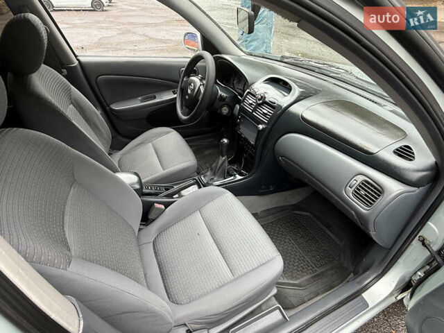 Серый Ниссан Альмера, объемом двигателя 1.6 л и пробегом 245 тыс. км за 3950 $, фото 16 на Automoto.ua