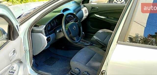 Серый Ниссан Альмера, объемом двигателя 1.6 л и пробегом 130 тыс. км за 4399 $, фото 7 на Automoto.ua