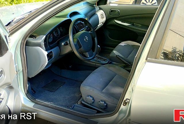 Серый Ниссан Альмера, объемом двигателя 1.6 л и пробегом 130 тыс. км за 4399 $, фото 8 на Automoto.ua