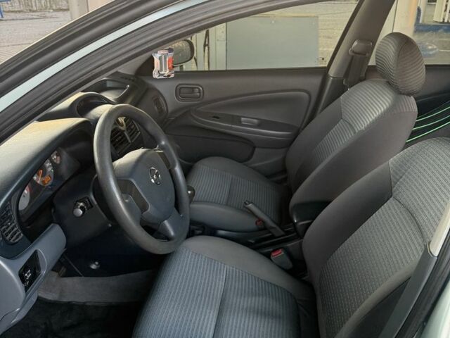 Сірий Ніссан Альмера, об'ємом двигуна 1.6 л та пробігом 162 тис. км за 4350 $, фото 7 на Automoto.ua