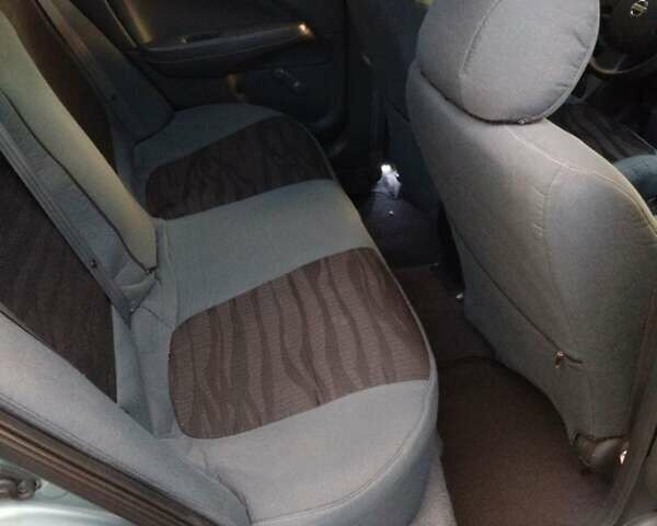 Серый Ниссан Альмера, объемом двигателя 1.6 л и пробегом 233 тыс. км за 3800 $, фото 9 на Automoto.ua