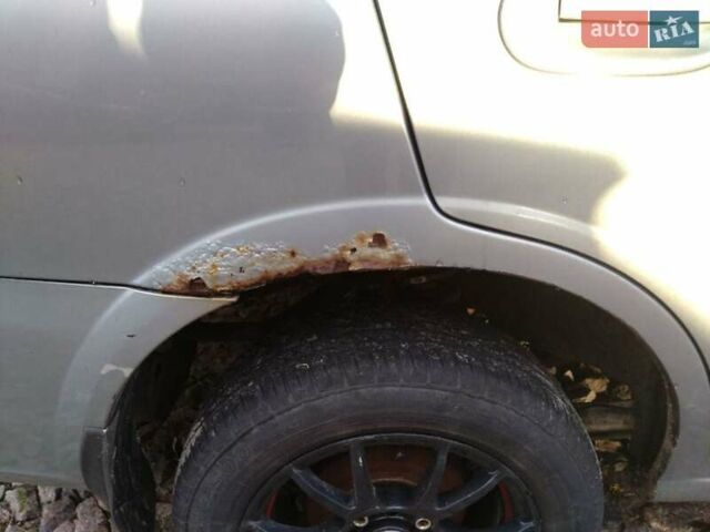 Серый Ниссан Альмера, объемом двигателя 1.6 л и пробегом 233 тыс. км за 3800 $, фото 13 на Automoto.ua