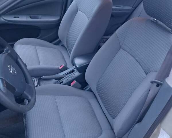 Серый Ниссан Альмера, объемом двигателя 1.6 л и пробегом 230 тыс. км за 4300 $, фото 5 на Automoto.ua