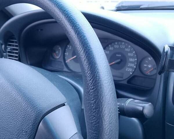 Серый Ниссан Альмера, объемом двигателя 1.6 л и пробегом 230 тыс. км за 4300 $, фото 3 на Automoto.ua