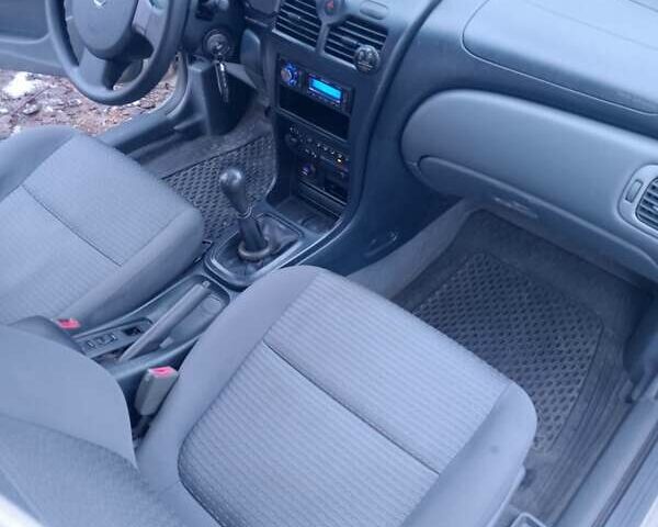 Серый Ниссан Альмера, объемом двигателя 1.6 л и пробегом 230 тыс. км за 4300 $, фото 4 на Automoto.ua