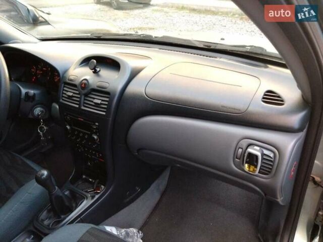 Серый Ниссан Альмера, объемом двигателя 1.6 л и пробегом 233 тыс. км за 3800 $, фото 1 на Automoto.ua