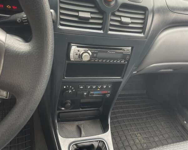 Серый Ниссан Альмера, объемом двигателя 1.6 л и пробегом 217 тыс. км за 3800 $, фото 8 на Automoto.ua