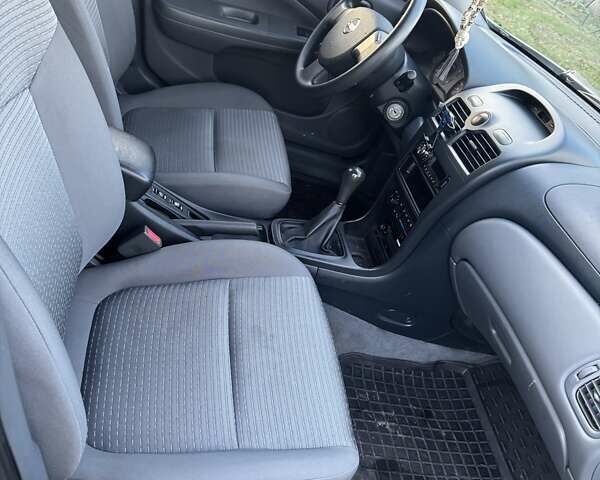 Серый Ниссан Альмера, объемом двигателя 1.6 л и пробегом 78 тыс. км за 6200 $, фото 7 на Automoto.ua