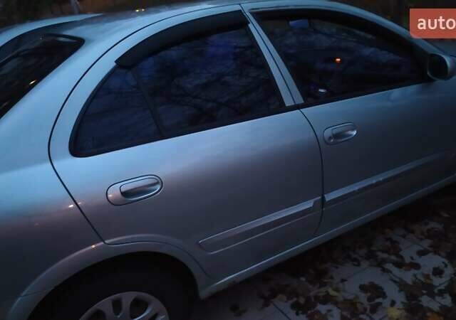 Сірий Ніссан Альмера, об'ємом двигуна 1.6 л та пробігом 240 тис. км за 4000 $, фото 5 на Automoto.ua