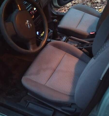 Сірий Ніссан Альмера, об'ємом двигуна 1.6 л та пробігом 240 тис. км за 4000 $, фото 6 на Automoto.ua