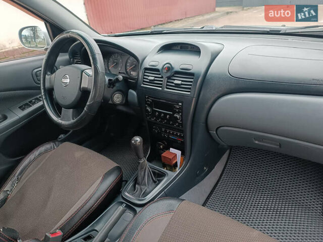 Серый Ниссан Альмера, объемом двигателя 1.6 л и пробегом 180 тыс. км за 5500 $, фото 7 на Automoto.ua