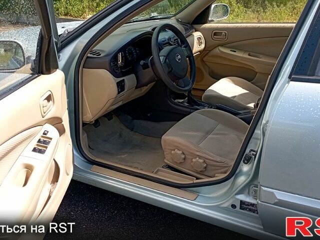 Серый Ниссан Альмера, объемом двигателя 1.6 л и пробегом 290 тыс. км за 3600 $, фото 7 на Automoto.ua