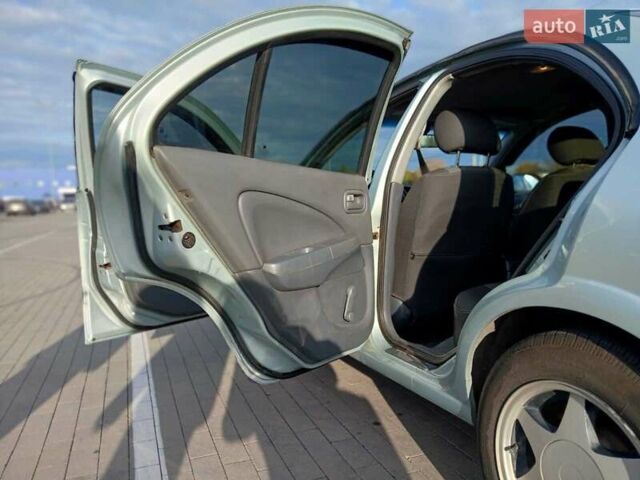 Серый Ниссан Альмера, объемом двигателя 1.6 л и пробегом 255 тыс. км за 4950 $, фото 21 на Automoto.ua