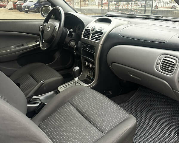 Сірий Ніссан Альмера, об'ємом двигуна 1.6 л та пробігом 220 тис. км за 4800 $, фото 8 на Automoto.ua