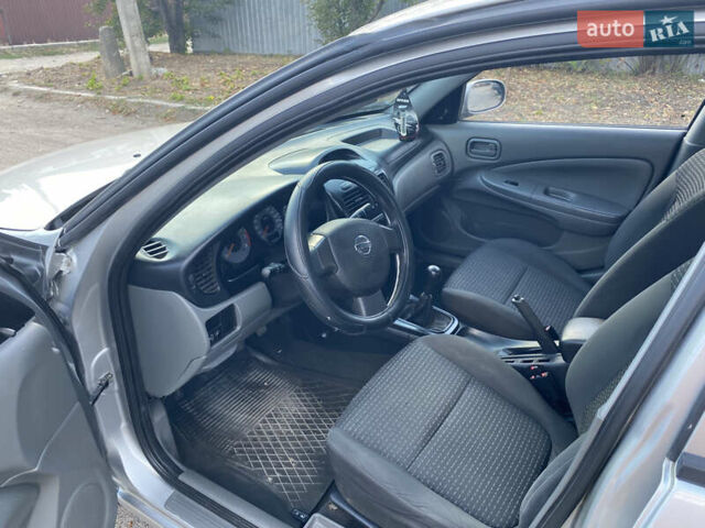 Сірий Ніссан Альмера, об'ємом двигуна 1.6 л та пробігом 228 тис. км за 4500 $, фото 10 на Automoto.ua