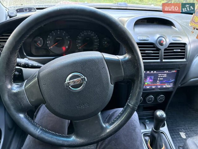 Сірий Ніссан Альмера, об'ємом двигуна 1.6 л та пробігом 230 тис. км за 4000 $, фото 5 на Automoto.ua