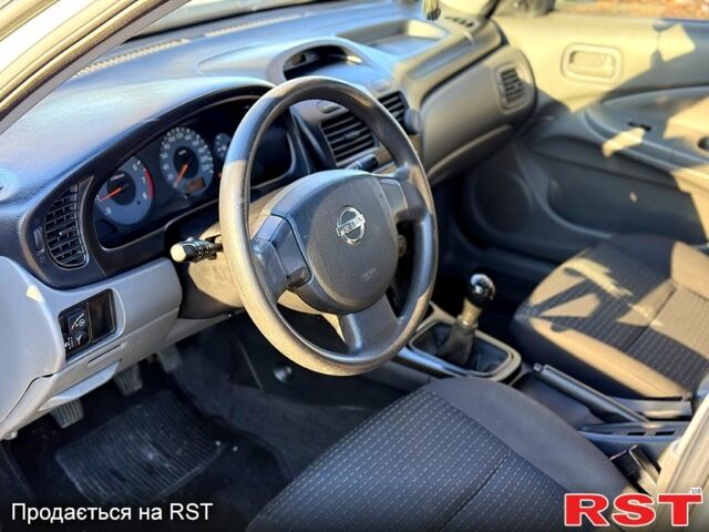 Серый Ниссан Альмера, объемом двигателя 16 л и пробегом 292 тыс. км за 3750 $, фото 6 на Automoto.ua