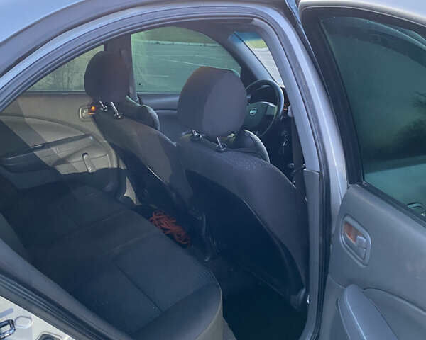 Серый Ниссан Альмера, объемом двигателя 1.6 л и пробегом 231 тыс. км за 3600 $, фото 6 на Automoto.ua