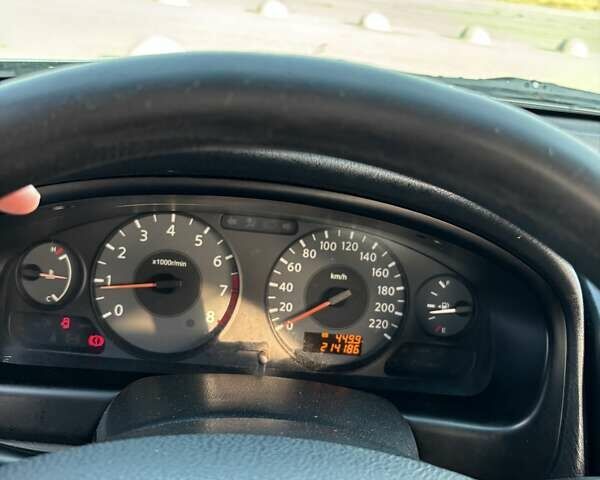 Серый Ниссан Альмера, объемом двигателя 1.6 л и пробегом 216 тыс. км за 4600 $, фото 7 на Automoto.ua