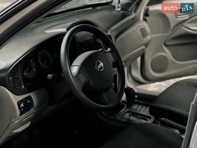 Серый Ниссан Альмера, объемом двигателя 1.6 л и пробегом 250 тыс. км за 4300 $, фото 10 на Automoto.ua