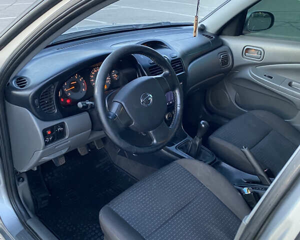 Серый Ниссан Альмера, объемом двигателя 1.6 л и пробегом 231 тыс. км за 3600 $, фото 8 на Automoto.ua