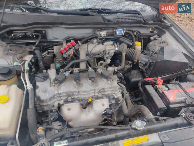 Сірий Ніссан Альмера, об'ємом двигуна 1.6 л та пробігом 190 тис. км за 3800 $, фото 6 на Automoto.ua