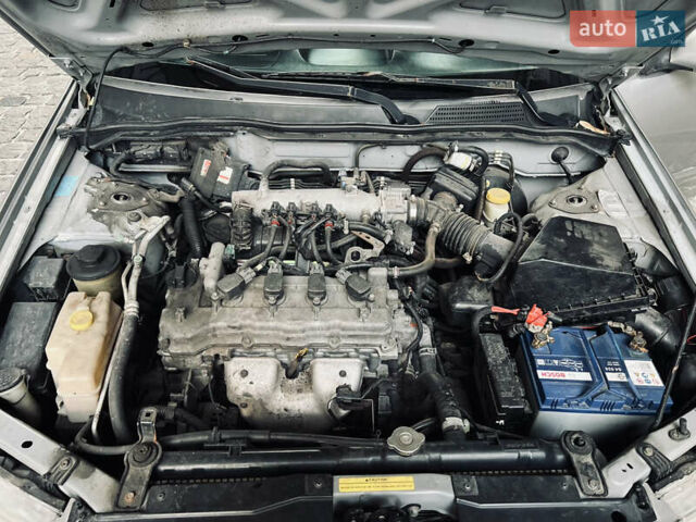Серый Ниссан Альмера, объемом двигателя 1.6 л и пробегом 250 тыс. км за 4300 $, фото 11 на Automoto.ua