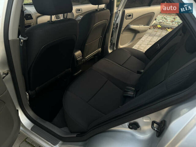 Сірий Ніссан Альмера, об'ємом двигуна 1.6 л та пробігом 39 тис. км за 7700 $, фото 70 на Automoto.ua