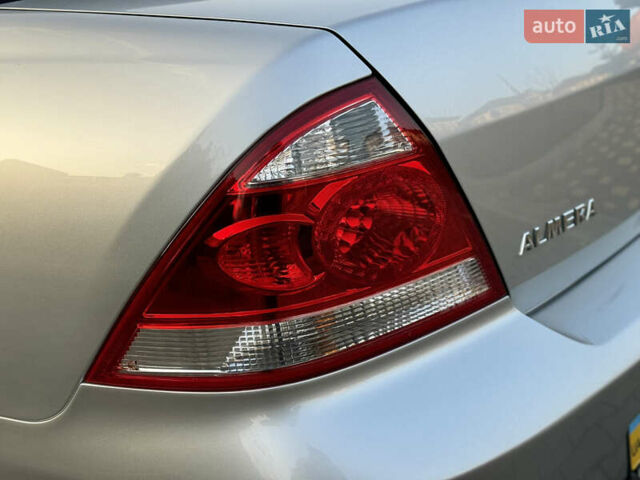Сірий Ніссан Альмера, об'ємом двигуна 1.6 л та пробігом 39 тис. км за 7700 $, фото 14 на Automoto.ua