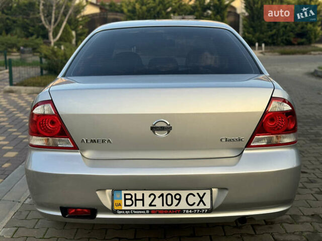 Сірий Ніссан Альмера, об'ємом двигуна 1.6 л та пробігом 39 тис. км за 7700 $, фото 20 на Automoto.ua