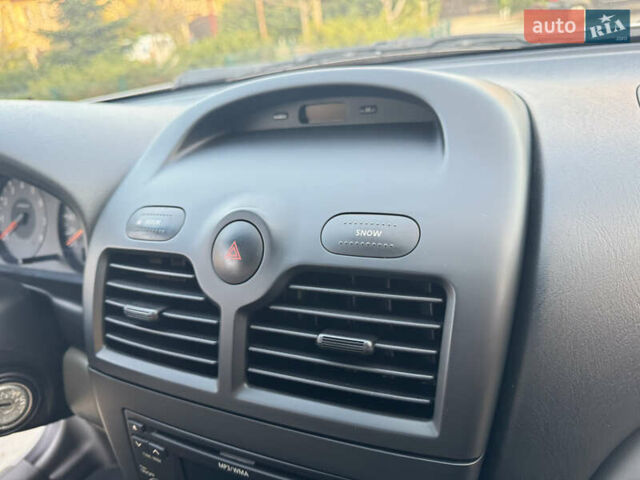 Сірий Ніссан Альмера, об'ємом двигуна 1.6 л та пробігом 39 тис. км за 7700 $, фото 60 на Automoto.ua