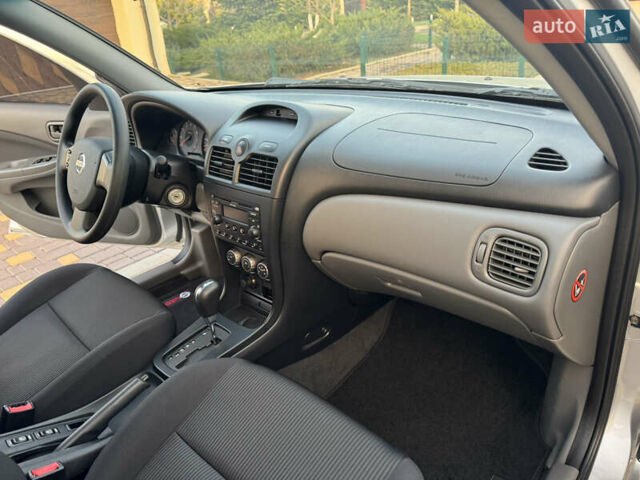 Сірий Ніссан Альмера, об'ємом двигуна 1.6 л та пробігом 39 тис. км за 7700 $, фото 58 на Automoto.ua