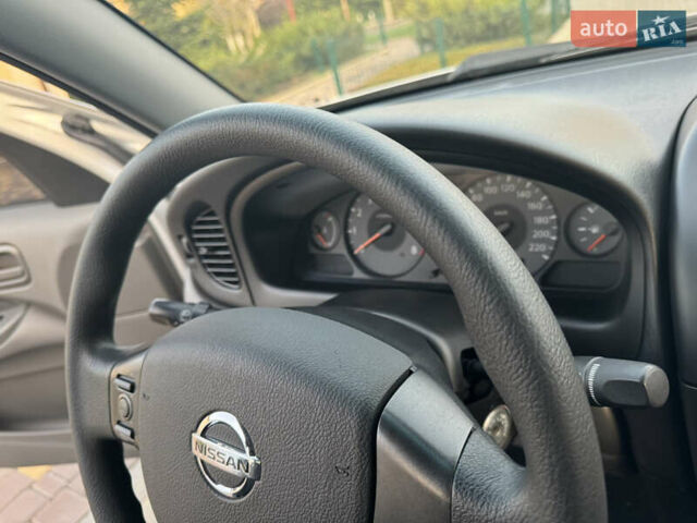 Сірий Ніссан Альмера, об'ємом двигуна 1.6 л та пробігом 39 тис. км за 7700 $, фото 67 на Automoto.ua