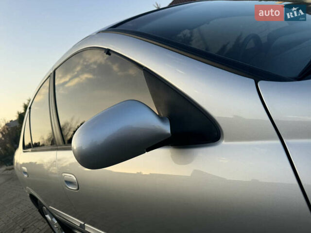 Сірий Ніссан Альмера, об'ємом двигуна 1.6 л та пробігом 39 тис. км за 7700 $, фото 32 на Automoto.ua