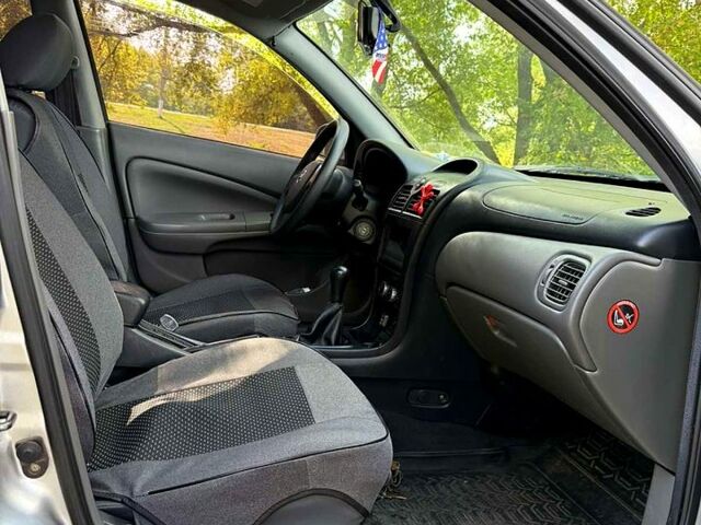 Серый Ниссан Альмера, объемом двигателя 1.6 л и пробегом 210 тыс. км за 5300 $, фото 6 на Automoto.ua