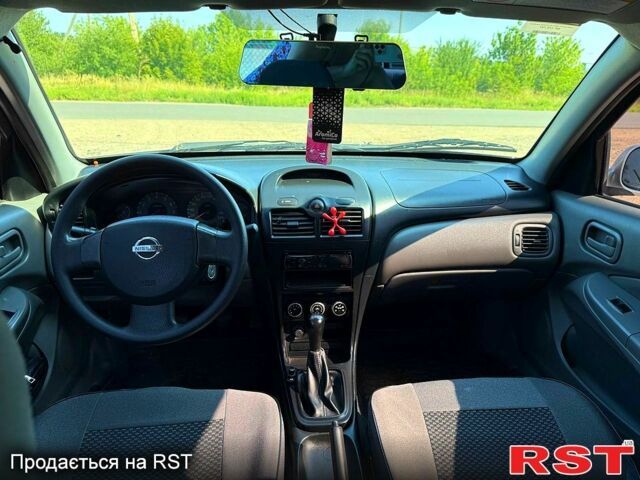 Серый Ниссан Альмера, объемом двигателя 1.6 л и пробегом 210 тыс. км за 5300 $, фото 7 на Automoto.ua