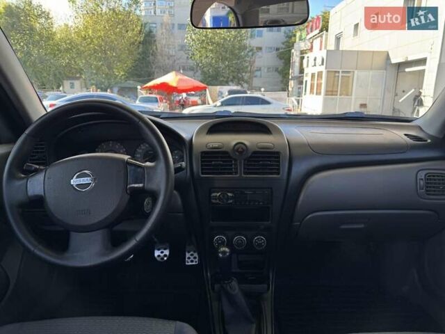 Серый Ниссан Альмера, объемом двигателя 1.6 л и пробегом 187 тыс. км за 4999 $, фото 4 на Automoto.ua
