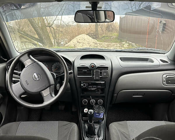 Серый Ниссан Альмера, объемом двигателя 1.6 л и пробегом 142 тыс. км за 6700 $, фото 6 на Automoto.ua