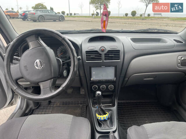 Серый Ниссан Альмера, объемом двигателя 1.6 л и пробегом 131 тыс. км за 5100 $, фото 7 на Automoto.ua