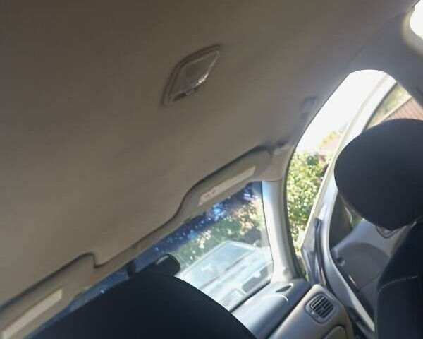 Сірий Ніссан Альмера, об'ємом двигуна 1.6 л та пробігом 263 тис. км за 4600 $, фото 6 на Automoto.ua