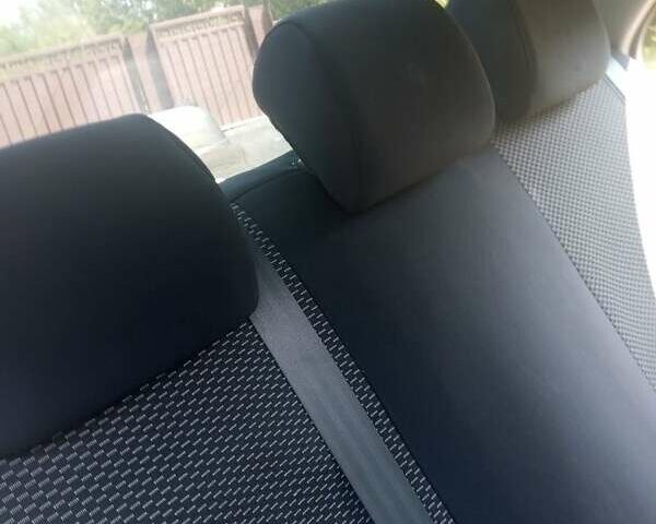 Сірий Ніссан Альмера, об'ємом двигуна 1.6 л та пробігом 263 тис. км за 4600 $, фото 5 на Automoto.ua