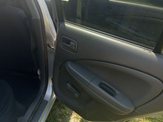 Серый Ниссан Альмера, объемом двигателя 1.6 л и пробегом 263 тыс. км за 4600 $, фото 10 на Automoto.ua