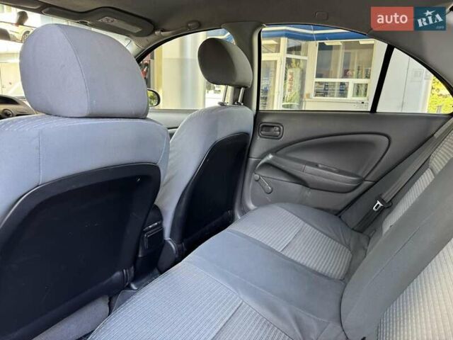 Серый Ниссан Альмера, объемом двигателя 1.6 л и пробегом 187 тыс. км за 4999 $, фото 6 на Automoto.ua