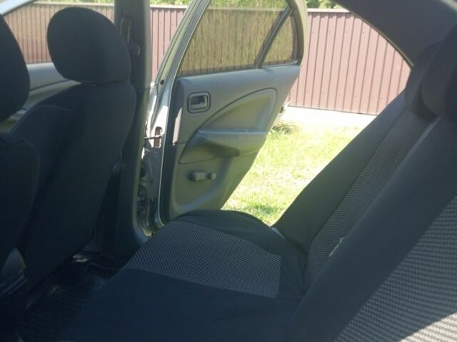 Серый Ниссан Альмера, объемом двигателя 1.6 л и пробегом 263 тыс. км за 4600 $, фото 11 на Automoto.ua