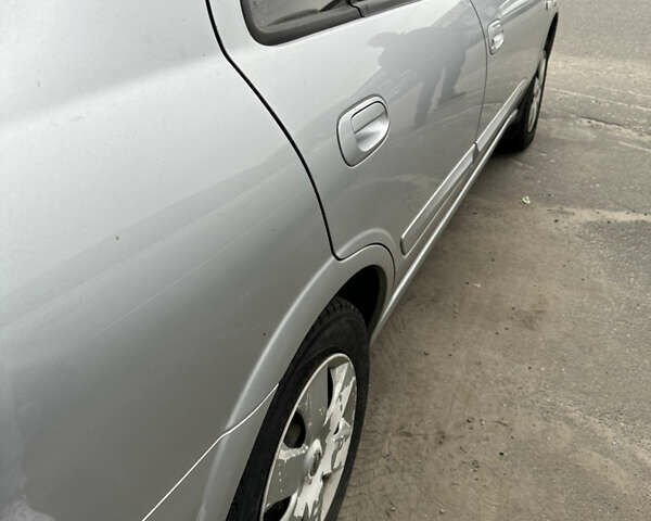 Сірий Ніссан Альмера, об'ємом двигуна 1.6 л та пробігом 178 тис. км за 5900 $, фото 7 на Automoto.ua