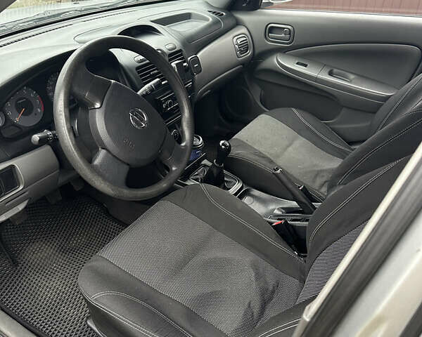 Серый Ниссан Альмера, объемом двигателя 1.6 л и пробегом 142 тыс. км за 6700 $, фото 7 на Automoto.ua