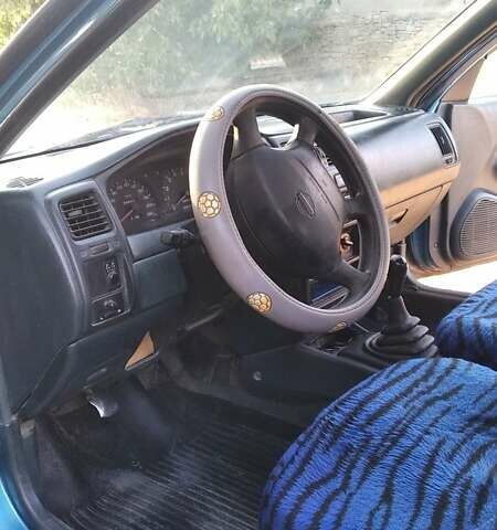 Синій Ніссан Альмера, об'ємом двигуна 1.4 л та пробігом 300 тис. км за 1500 $, фото 1 на Automoto.ua