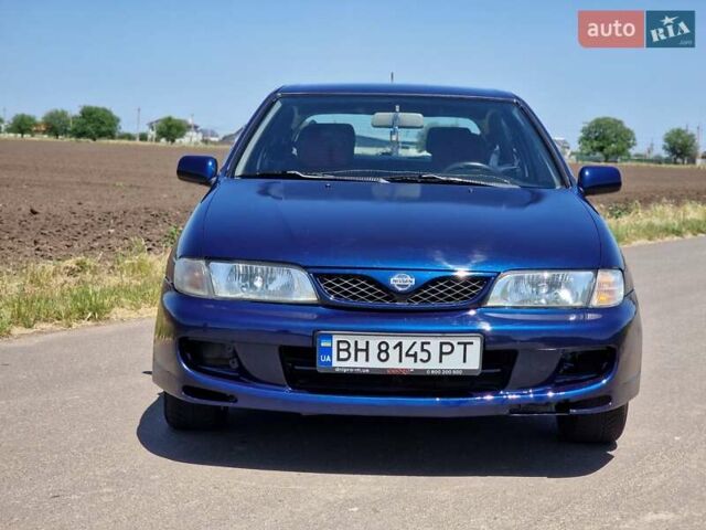 Синій Ніссан Альмера, об'ємом двигуна 1.4 л та пробігом 312 тис. км за 2050 $, фото 2 на Automoto.ua